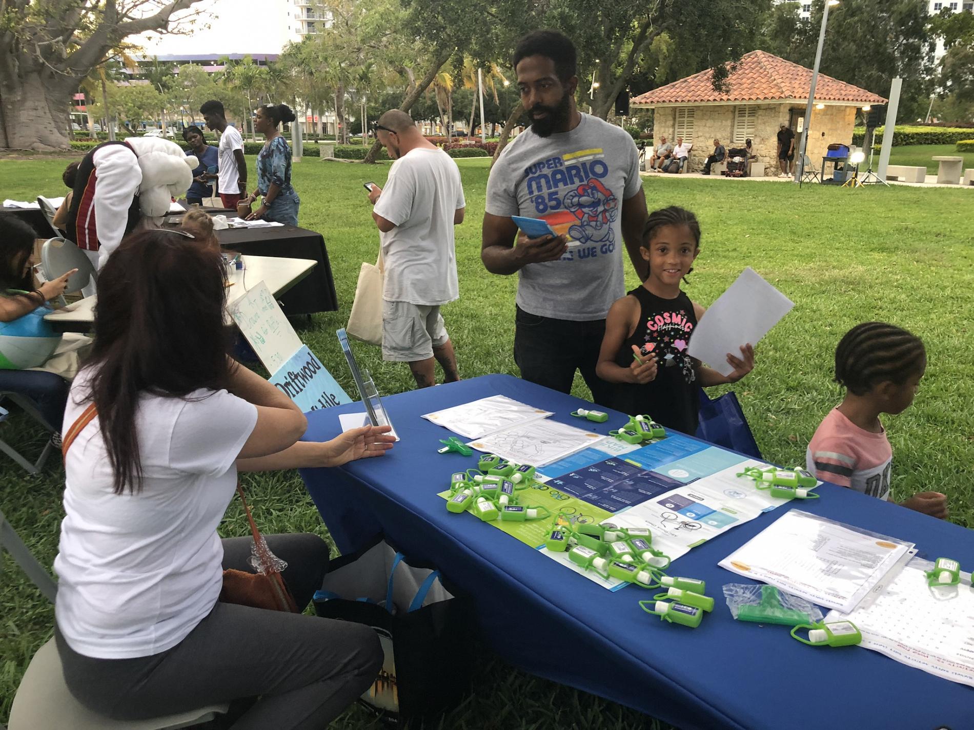 MPOer Charlene engaging kids with bike safety worksheets